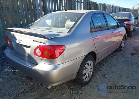 2003 Toyota Corolla Le from USA, damaged, VIN 2T1BR32E73C086555